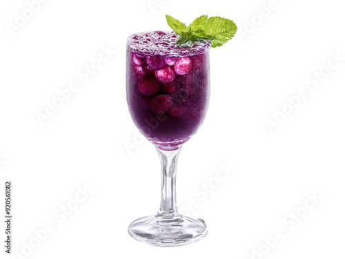 Illawarra plum soda in a dessert glass Illawarra plum pieces and mint leaves deep purple