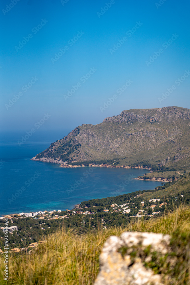 view over Formentor hill and lighthouse in mallorca on a summer evening view over Formentor hill and lighthouse in mallorca on a summer evening