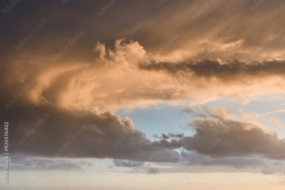 Beautiful vibrant sunset clouds with blue sky Beautiful vibrant sunset clouds with blue sky