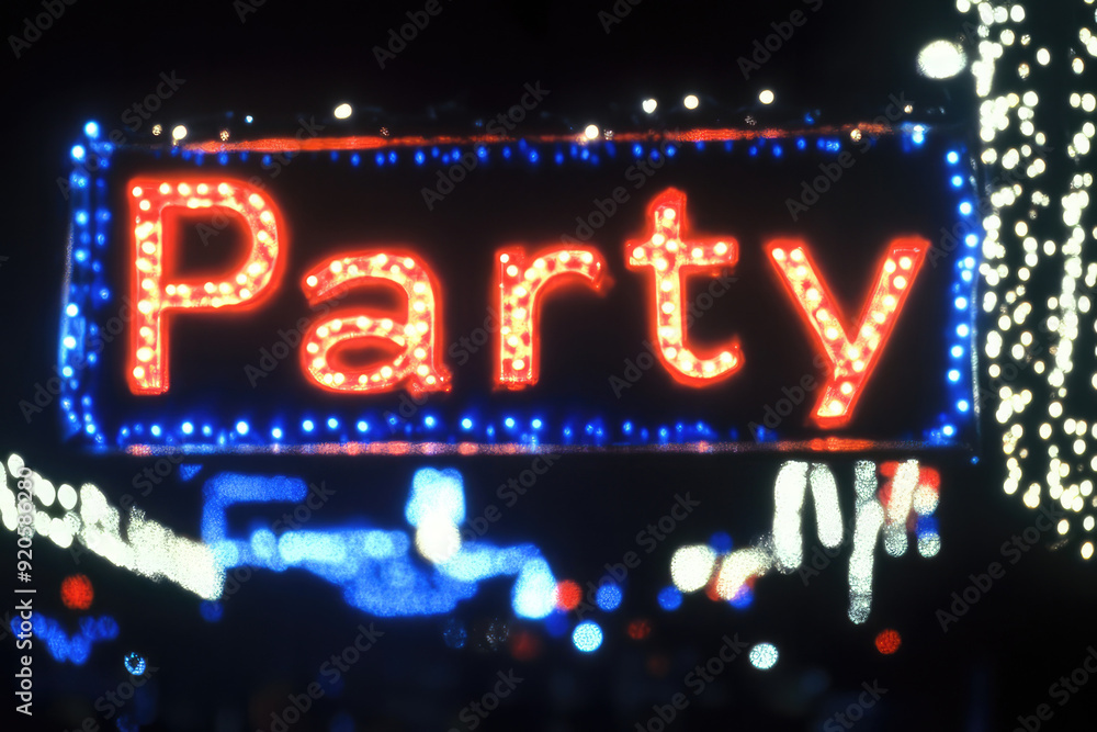 A vibrant party sign illuminated with neon lights against a dark background, creating a fun and energetic atmosphere perfect for nighttime events. A vibrant party sign illuminated with neon lights against a dark background, creating a fun and energetic atmosphere perfect for nighttime events.