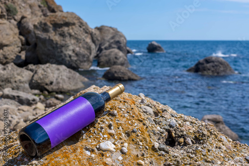 Bottle of wine by the sea