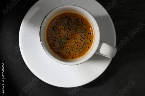 cup of traditional turkish coffee on black background photo