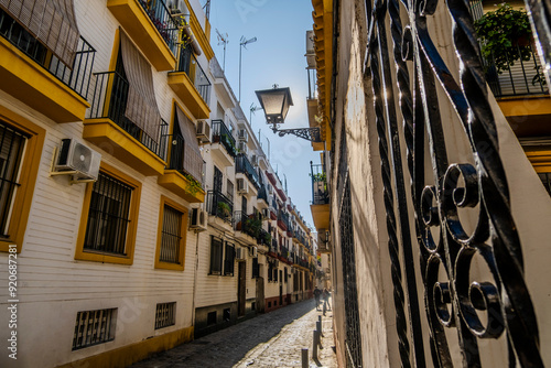 Obraz na płótnie Charming street with lantern in historic old town of Seville, Spain w salonie