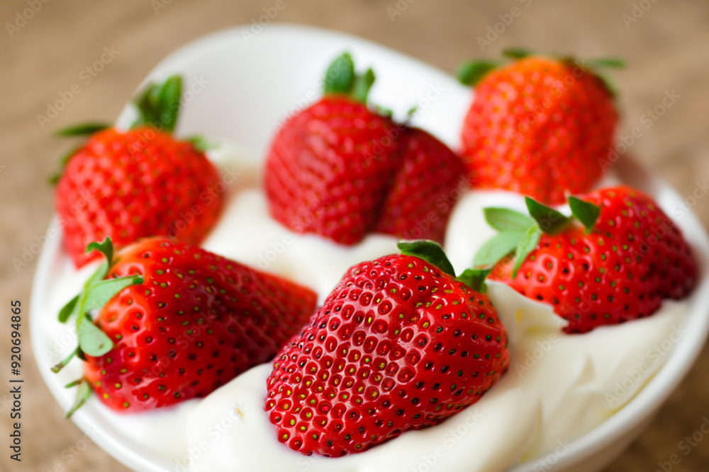 Romantic food with strawberries and whipped cream. Dessert fresh summer concept. Strawberries and white whipped cream floating on the sea. Romantic food with strawberries and whites floating in the. Romantic food with strawberries and whipped cream. Dessert fresh summer concept. Strawberries and white whipped cream floating on the sea. Romantic food with strawberries and whites floating in the.
