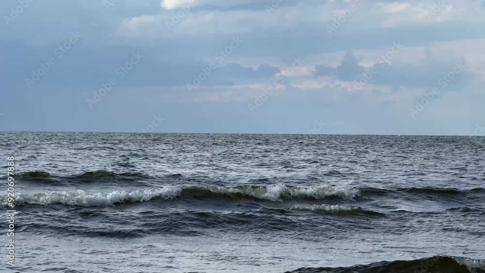 Waves of North sea and cloudy sky Waves of North sea and cloudy sky