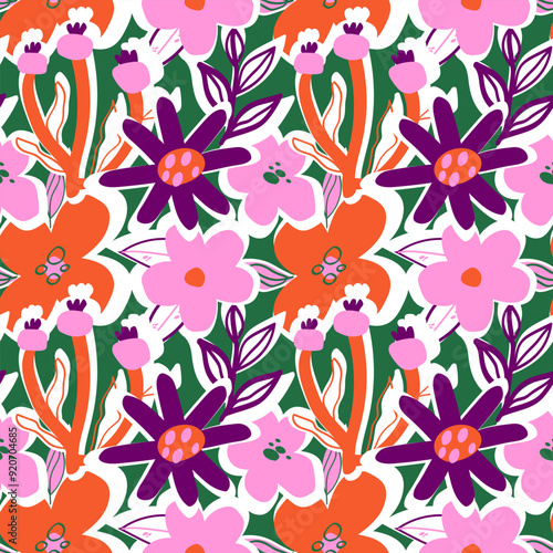 Various abstract flowers on a green background seamless pattern. Bright floral ornament in the style of naive art.