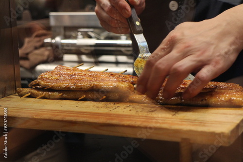 Cooking scene of Japanese cuisine (eel bowl) in Tokyo, Japan