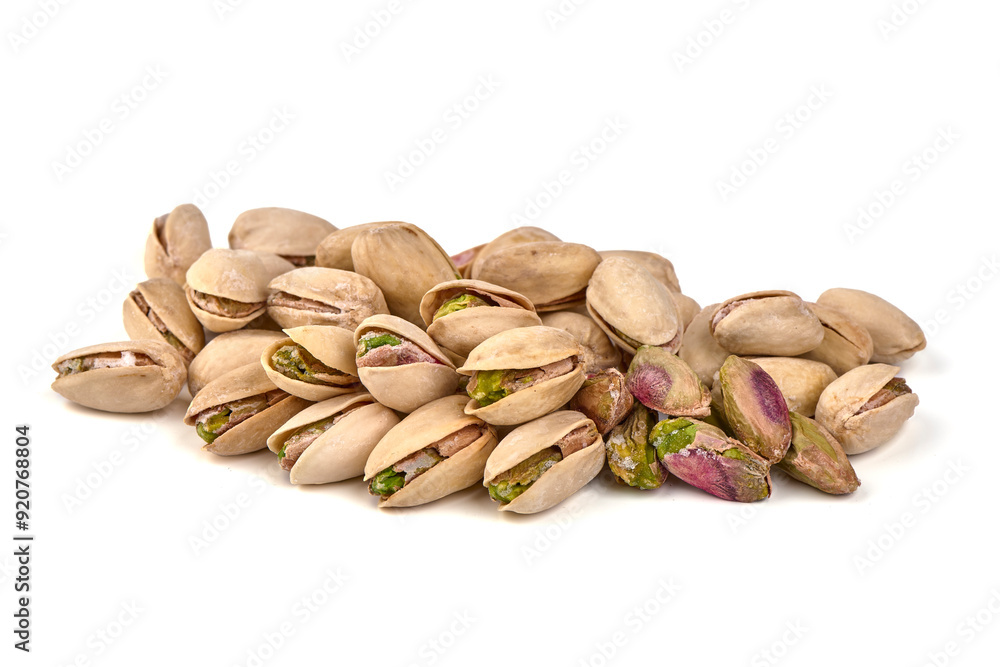 Pistachio nuts, isolated on white background. High resolution image. Pistachio nuts, isolated on white background. High resolution image.