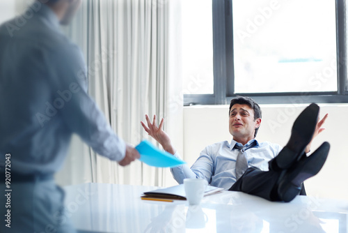 Photos Lazy, businessman and relax with argument in office for meeting, negligence or lack of productivity