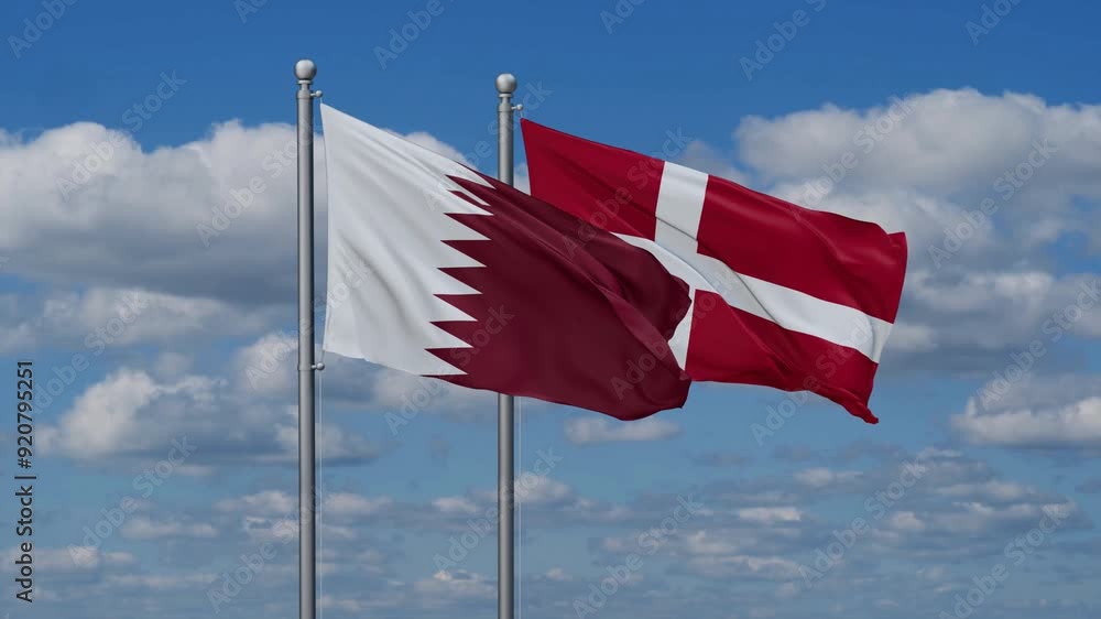Denmark and Qatar flags flying together, video concept of the relationship, two country relations concept Denmark and Qatar flags flying together, video concept of the relationship, two country relations concept