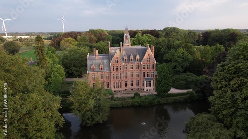 Explore the enchanting Loppem Castle in a beautiful park with serene ponds in Belgium photo