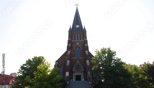 Aerial footage of Nagold church, drone flight upwards along frontal view of church tower isolated with white highlights, png photo