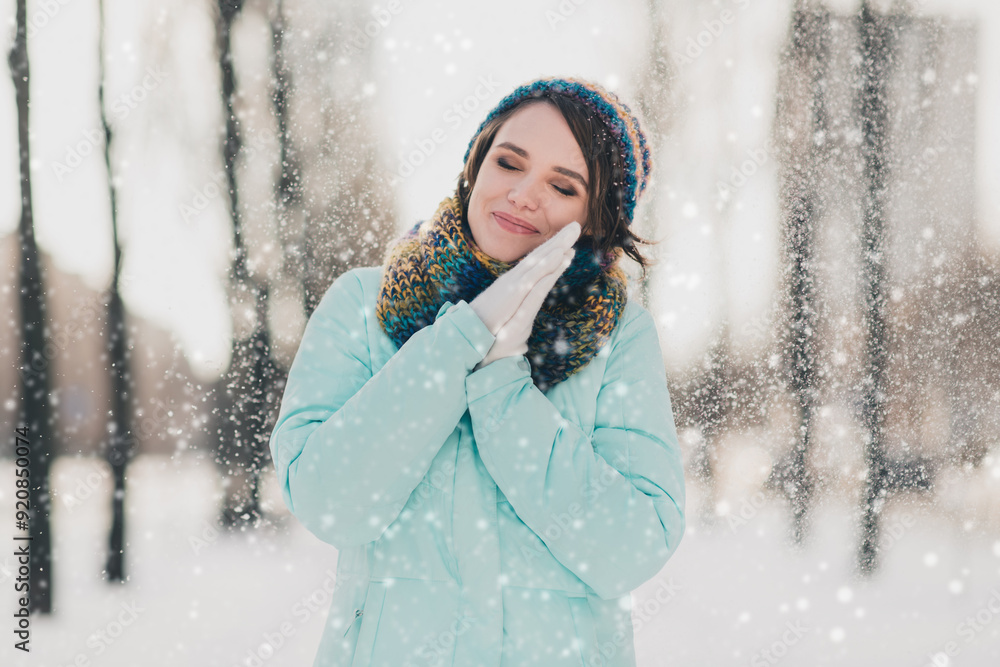 Photo of happy calm nice joyful young woman weekend holiday in park snow fall flakes outdoors outside Photo of happy calm nice joyful young woman weekend holiday in park snow fall flakes outdoors outside