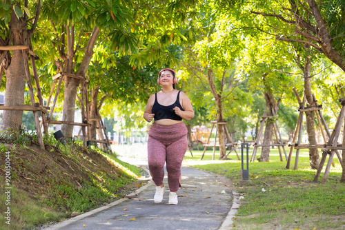 Bride Running outdoor woman. beautiful young chubby overweight woman in sportswear doing exercise outdoors at park. fitness sport club, body and health care. Activity