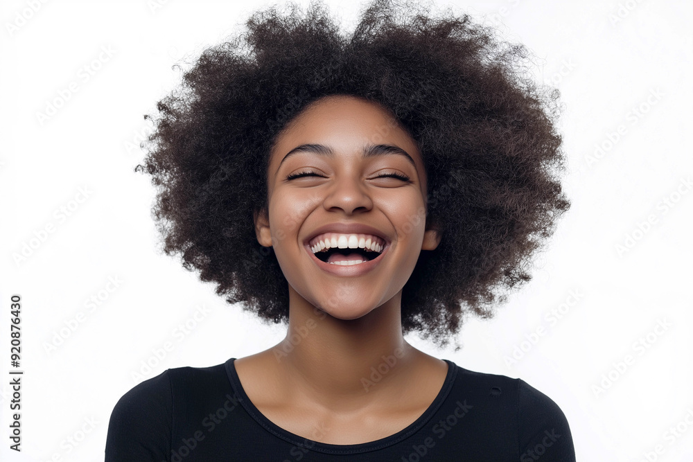 Close-up of a woman of African-American appearance, smiling happily, in a state of joy and delight, emotions, on a white background, medium plan. Advertising banner. Close-up of a woman of African-American appearance, smiling happily, in a state of joy and delight, emotions, on a white background, medium plan. Advertising banner.