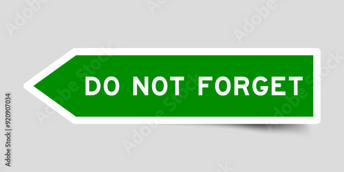 Green color arrow shape sticker label with word do not forget on gray background