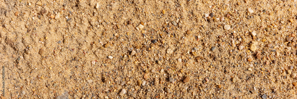 Panoramic image. Fine gravel for the construction. Fine gravel background Panoramic image. Fine gravel for the construction. Fine gravel background
