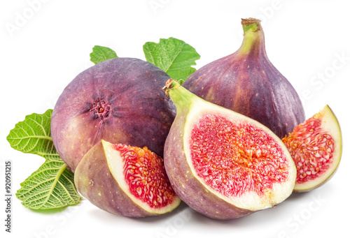 Fig fruits with fig leaves and slices of fig isolated on white background. photo