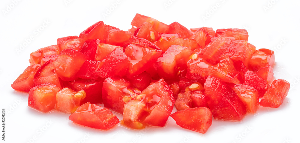 Peeled and diced fresh tomatoes isolated on white background. Macro shot. Peeled and diced fresh tomatoes isolated on white background. Macro shot.