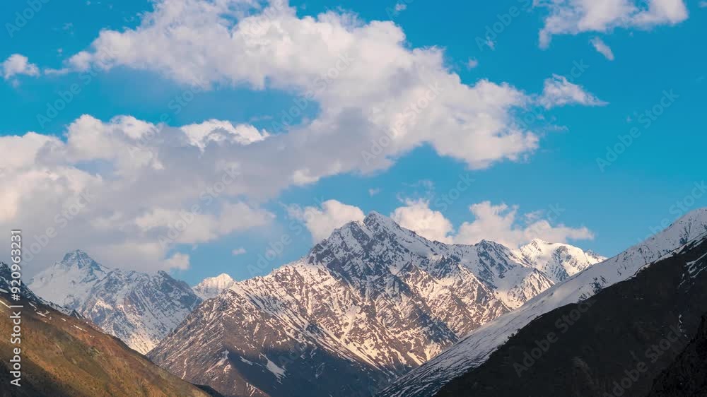 4K Zoom In Time lapse of clouds moving over snowy mountains during sunset at Darcha, Lahaul, India. Mesmerizing Himalaya landscape. Time lapse of sky and clouds during the sunset 4K Zoom In Time lapse of clouds moving over snowy mountains during sunset at Darcha, Lahaul, India. Mesmerizing Himalaya landscape. Time lapse of sky and clouds during the sunset
