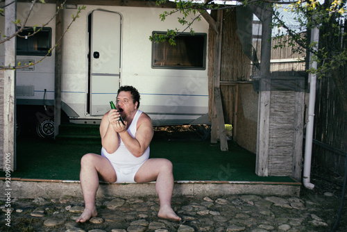 The poor man lives in a trailer park.