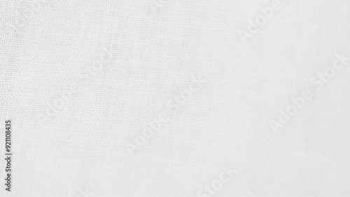 Close-up of fabric woven from burlap. White jute texture
