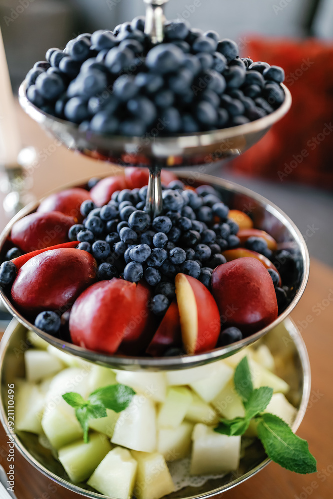 Fruit slices in a beautiful serving, snacks at a celebration Fruit slices in a beautiful serving, snacks at a celebration