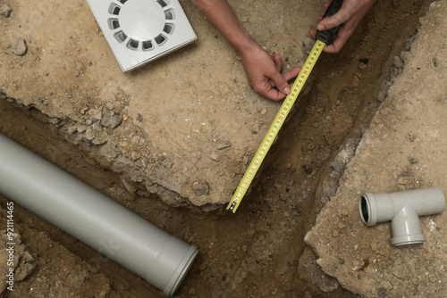Cuadro en lienzo Process of installing PVC pipes sewage system in bathroom, DIY home renovation