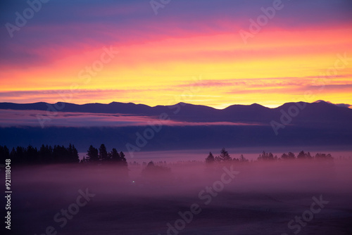 Red filled sky over the mountains at sunset 