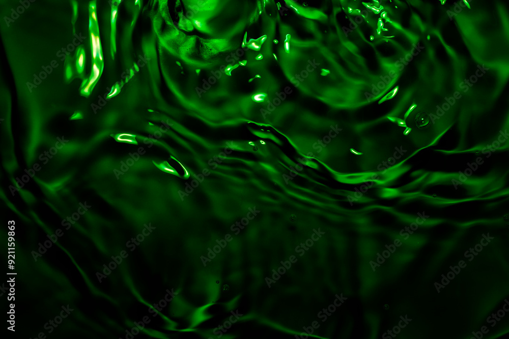 The water waves are green and black. The water waves are green and black.
