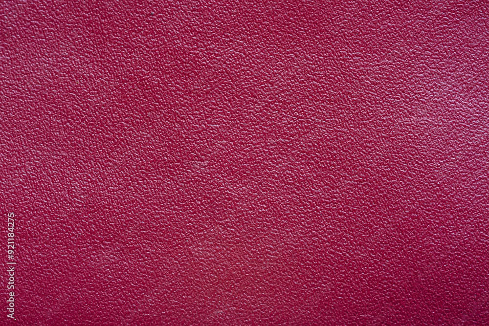 Fototapeta premium Red macro leather texture,Texture of artificial leather scarlet color,Leather samples with stitches