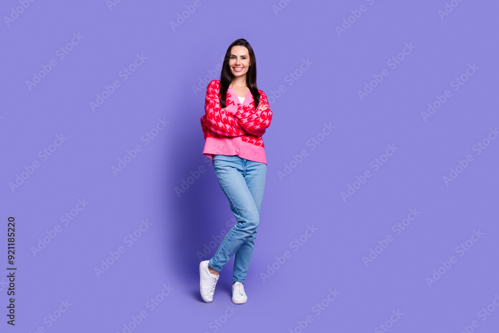 Photo of cheerful pretty lady dressed pink cardigan arms crossed empty space isolated violet color background Photo of cheerful pretty lady dressed pink cardigan arms crossed empty space isolated violet color background