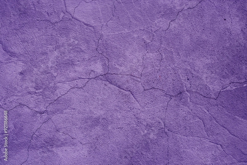 Abstract purple cement wall texture background with cracks photo