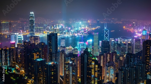 Wallpaper Mural A night view of a city, with buildings illuminated by countless lights, creating a stunning display against the dark sky. Torontodigital.ca