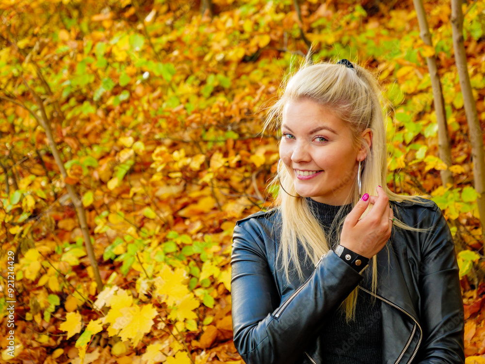 Fashion woman relaxing in autumn park Fashion woman relaxing in autumn park