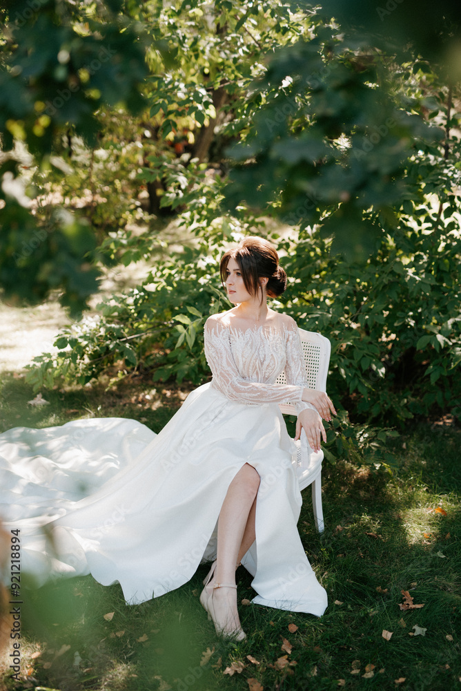 young girl bride in spring garden