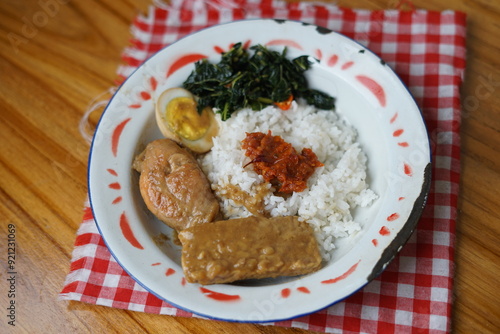 rice with chicken, egg and tempeh in braised sauce