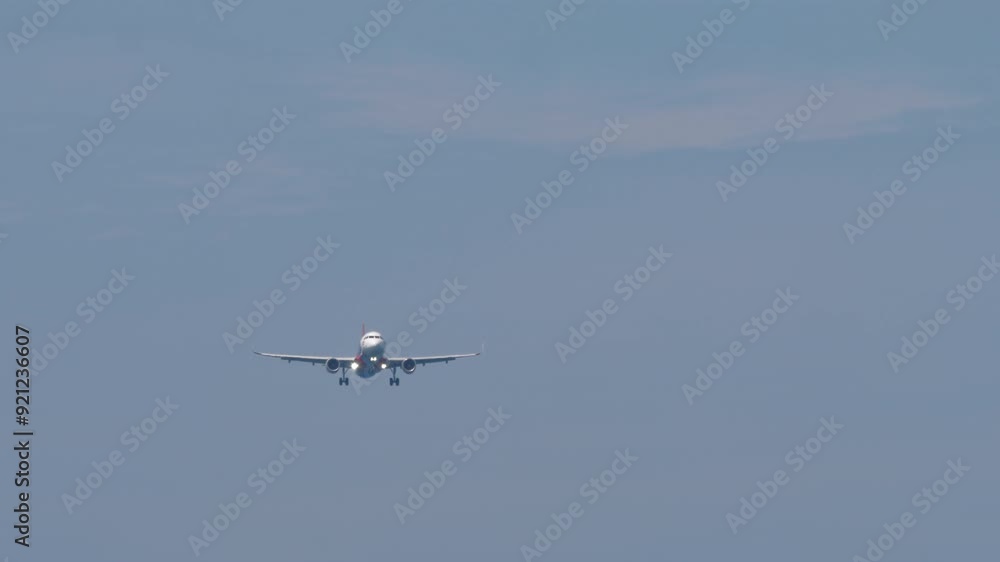Passenger aircraft approaching landing. Airliner flying, front view. Travel concept Passenger aircraft approaching landing. Airliner flying, front view. Travel concept