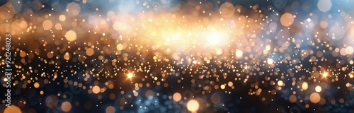 Bokeh Lights and Glittering Sparkles on Dark Background