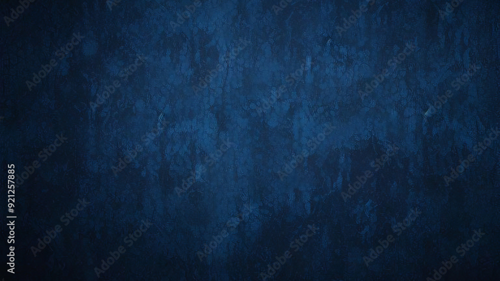 Obraz premium A blue grunge background with a faded surface. Ideal for design projects