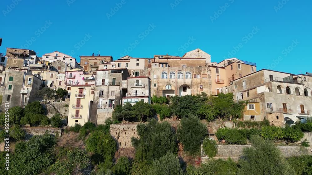 Pisciotta, a historic village in the Cilento National Park, Italy, known for its ancient olive groves and stunning Mediterranean views. Aerial footage captures its unique charm and natural beauty. Pisciotta, a historic village in the Cilento National Park, Italy, known for its ancient olive groves and stunning Mediterranean views. Aerial footage captures its unique charm and natural beauty.