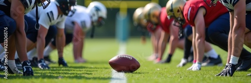 Intense football showdown featuring players in a ready stance, showcasing athleticism and competition. Perfect for sports marketing, events, and team promotions.