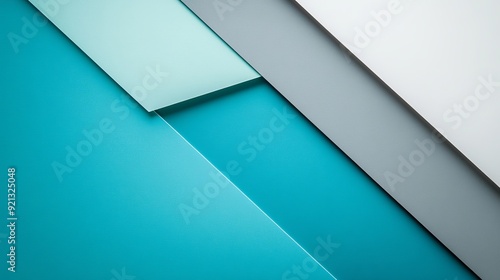 Colorful layered paper in shades of blue and gray on a modern background