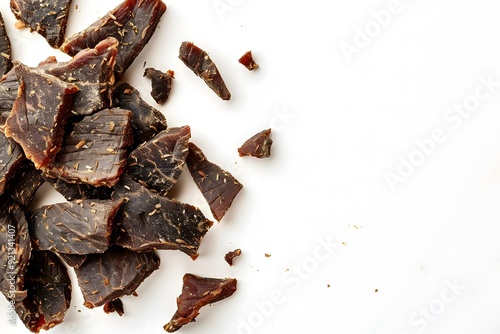 Wallpaper Mural Beef jerky on white background, dried meat snack, high protein, minimalist food photography, flat lay

 Torontodigital.ca