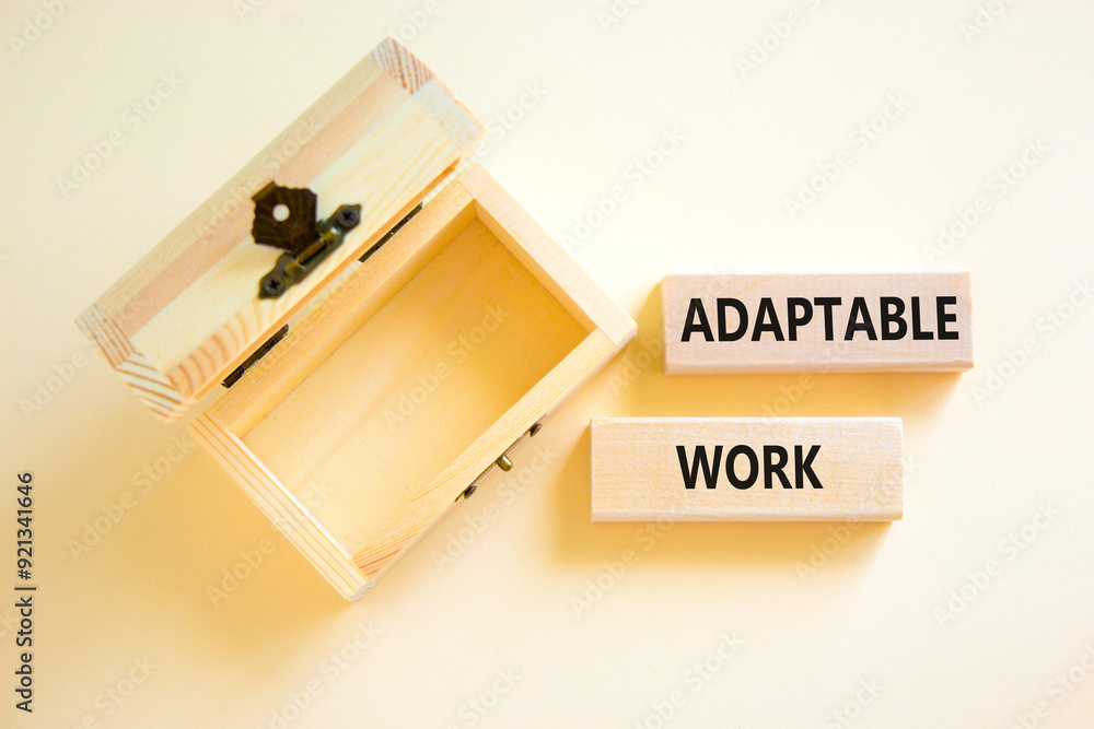 Adaptable work symbol. Concept words Adaptable work on beautiful wooden block. Beautiful white paper background. Empty wooden chest. Business Adaptable work concept. Copy space. Adaptable work symbol. Concept words Adaptable work on beautiful wooden block. Beautiful white paper background. Empty wooden chest. Business Adaptable work concept. Copy space.