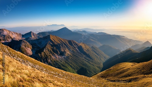 anorama of the mountains in the morning background photo