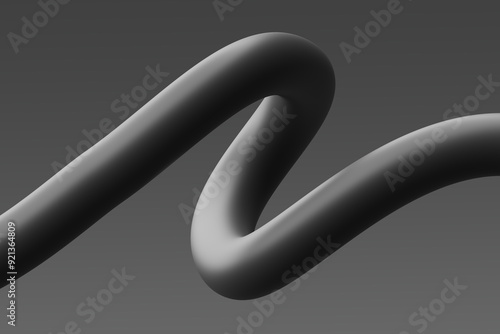 Curved black sculpture with smooth lines against a gray background