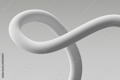 Obraz na płótnie A smooth white ribbon loops elegantly against a minimalist gray backdrop w salonie