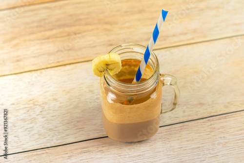 drink peanut better shake in a jar banana straw