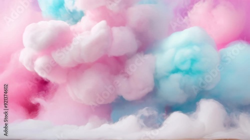 Soft, fluffy clouds in pastel shades of blue, pink, and lavender blend together, creating a dreamy, ethereal atmosphere